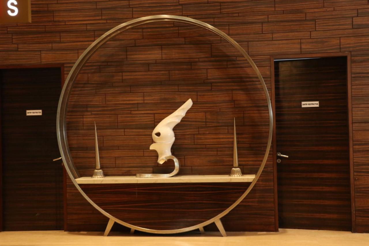 Holiday Inn Chandigarh Panchkula, An Ihg Hotel Exterior photo The sculpture of the hotel's logo